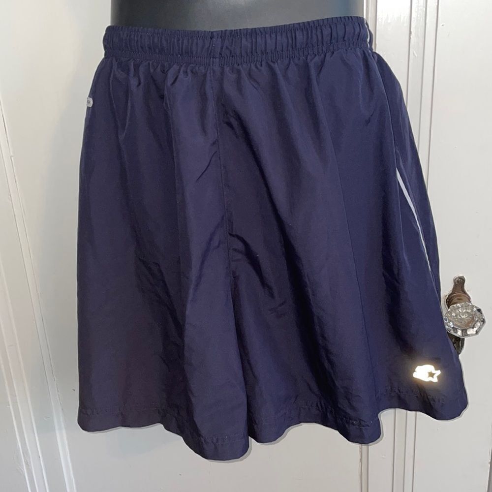 Vtg 90s Starter Dri-Star navy blue polyester running shorts with white stripes